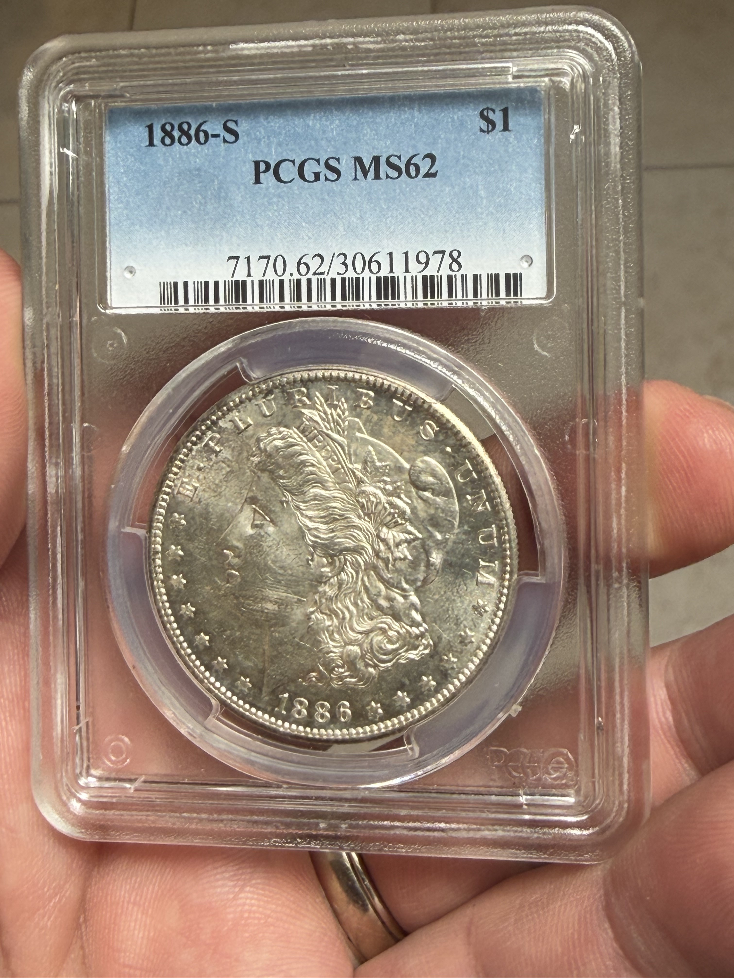1886-S Morgan dollar in a PCGS MS62 holder